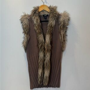 NILS faux vest. Size L. (Perfect for the 10-12)